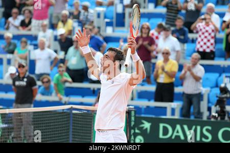 13.09.2013., Stadio Stella Maris, Umago - Coppa Davis di BNP Paribas World Group play-off, Croazia - Gran Bretagna, Ivan Dodig - Daniel Evans. Ivan Dodig festeggia dopo aver sconfitto Evans Foto: Sanjin Strukic/PIXSELL Foto Stock