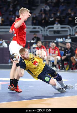 CAIRO, EGITTO - 31 GENNAIO: Jim Gottfridsson di Svezia durante la partita finale del Campionato Mondiale IHF uomo 27th tra Danimarca e Svezia - Campionato Mondiale IHF Men's Handball Final 2021 al Cairo Stadium Sports Hall il 31 gennaio 2021 al Cairo, Egitto. Foto: Slavko Midzor/PIXSELL Foto Stock