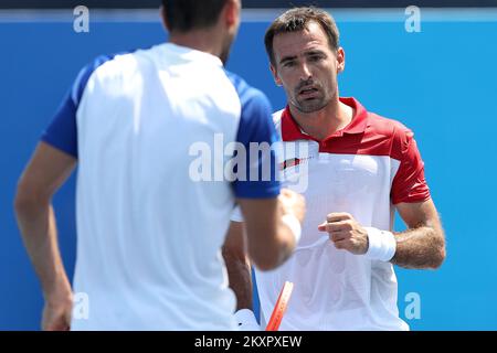 Ivan Dodig di Croazia festeggia dopo un certo punto durante la sua partita di Quaterfinale maschile con Marin Cilic di Croazia contro Andy Murray e Joe Salisbur di Gran Bretagna il quinto giorno dei Giochi Olimpici di Tokyo 2020 all'Ariake Tennis Park il 28 luglio 2021 a Tokyo, Giappone. Foto: Igor Kralj/PIXSELL Foto Stock