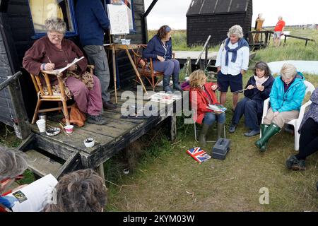 gruppo di artisti di bungay black dog art club pittura a walberswick suffolk inghilterra Foto Stock