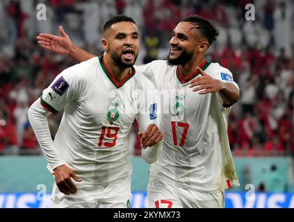 Doha, Qatar. 1st Dec, 2022. Youssef en-Nesyri (L) del Marocco festeggia con Sofiane Boufal dopo aver segnato durante la partita di Gruppo F tra Canada e Marocco alla Coppa del mondo FIFA 2022 allo stadio al Thumama di Doha, Qatar, il 1 dicembre 2022. Credit: Li Gang/Xinhua/Alamy Live News Foto Stock