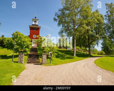 Kirkan, Gunnarskog, Svezia - Luglio 2021: La chiesa di Bogen fu costruita nel 1851 su disegno di Johan Fredrik Åbom. Riflette la semplicità t Foto Stock