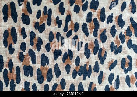 Immagine della texture tessile della stampa animale. Sfondo in pelliccia di leopardo Foto Stock