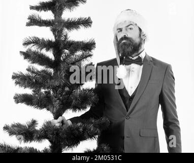 Il regista con barba si prepara per Natale. Festa aziendale di Natale Foto Stock