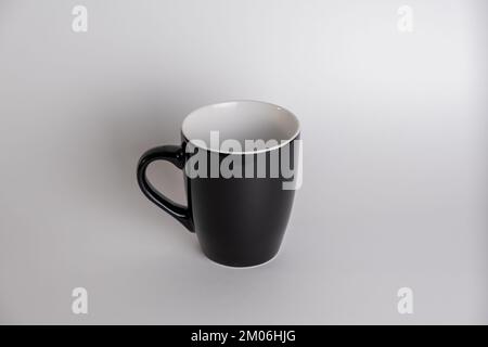 Tazza nera isolati su sfondo bianco Foto Stock