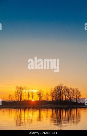 Tramonto su Shady Island a Steveston British Columbia Canada Foto Stock