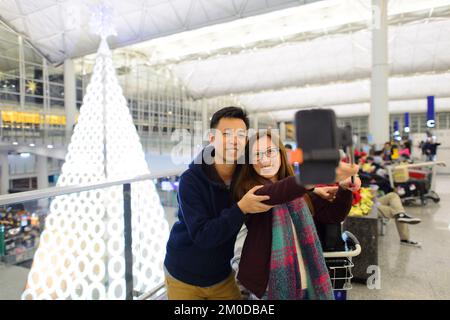HONG KONG - 10 DICEMBRE: Selfie all'aeroporto internazionale di Hong Kong il 10 dicembre 2014 a Hong Kong, Cina. E' uno dei migliori aeroporti dell'anno Foto Stock