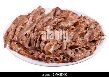 Kebab donatore di carne sul piatto. Kebab, donatore di carne turco, isolato su fondo bianco. Cucina turca tradizionale. primo piano Foto Stock