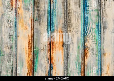 Struttura in legno dipinta con motivi multicolori, decorativo, design colorato interni tavole colore superficie recinto sfondo. Foto Stock