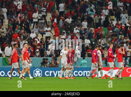 Lusail, Qatar. 6th Dec, 2022. I giocatori della Svizzera reagiscono dopo la partita del turno di 16 tra Portogallo e Svizzera della Coppa del mondo FIFA 2022 allo stadio di Lusail, in Qatar, il 6 dicembre 2022. Credit: Ding Xu/Xinhua/Alamy Live News Foto Stock