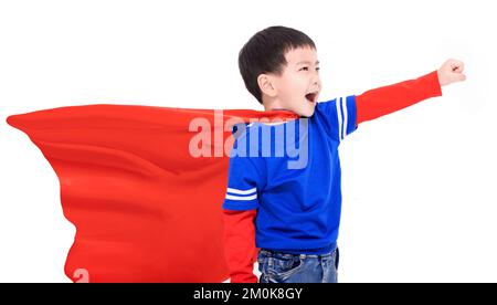 Felice bambino in rosso super eroe capo e maschera Foto Stock