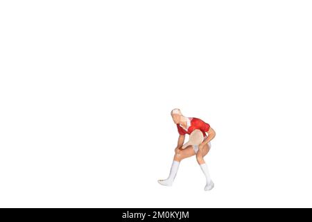 tennista in posa , isolato su sfondo bianco, persone in miniatura Foto Stock