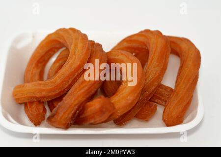 Turco Churros, cibo di strada molto popolare o dessert di strada in Turchia, Halka Tatlisi dessert circolare fritto in olio e zuccherato con sciroppo di miele, s Foto Stock