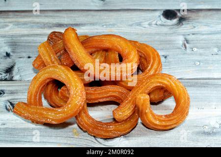 Turco Churros, cibo di strada molto popolare o dessert di strada in Turchia, Halka Tatlisi dessert circolare fritto in olio e zuccherato con sciroppo di miele, s Foto Stock