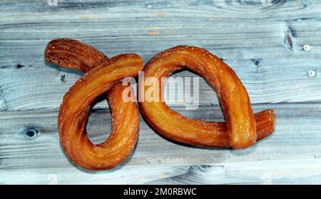 Turco Churros, cibo di strada molto popolare o dessert di strada in Turchia, Halka Tatlisi dessert circolare fritto in olio e zuccherato con sciroppo di miele, s Foto Stock