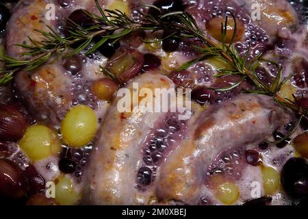 Salsiccia con uva, piatto del sud Italia Foto Stock