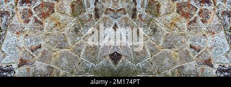 Robusto muro in pietra con taglio giallo e beige, ideale per sfondi, senza cuciture allineate Foto Stock