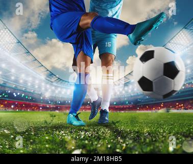 Scena calcistica con giocatori di calcio in competizione allo stadio Foto Stock