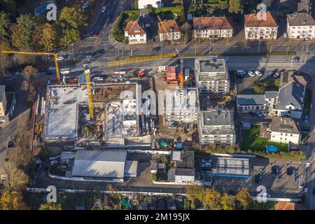 Vista aerea, cantiere con nuovo edificio per l'edilizia abitativa e servizi sociali sul sito ex Mercedes Lueg Wilhelmstraße a Gladbeck, Ruhr Foto Stock