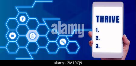 La scrittura che mostra il testo prospera. Concetto di Internet pensare positivamente continuare a prosperare e fiorire il tempo di fiorire Foto Stock