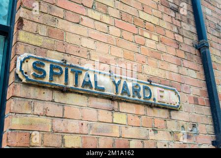 Spital Yard, E1, cartello stradale a Bishopsgate, City of London, UK. Link storico al mercato di Spitalfields Foto Stock