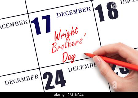 Dicembre 17. Scrivere a mano il testo Wright Brothers' Day nella data del calendario. Salvare la data. Vacanza. Concetto giorno dell'anno. Foto Stock