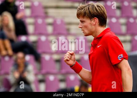 20120914 - BRUXELLES, BELGIO: Il belga David Goffin festeggia il secondo gioco della Coppa Davis tra Belgio e Svezia, per il World Group al Royal Primerose Tennis Club di Bruxelles, venerdì 14 settembre 2012. Il belga David Goffin (ATP 56) e lo svedese Andreas Vinciguerra giocano il secondo di cinque partite. BELGA PHOTO VIRGINIE LEFOUR Foto Stock