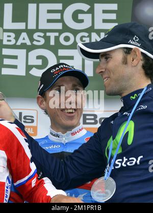 20130421 - LIEGE, BELGIO: L'irlandese Daniel Martin del team Garmin-Sharp conquista la sua vittoria sul podio con lo spagnolo Alejandro Valverde di Movistar (secondo) dopo la 99th edizione della gara ciclistica Liegi-Bastogne-Liegi di un giorno, domenica 21 aprile 2013, a Liegi. BELGA FOTO BENOIT DOPPAGNE Foto Stock