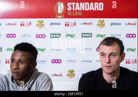 20150203 - LIEGE, BELGIO: Imoh Ezekiel, nuovo giocatore della Standard, e Axel Lawaree, consigliere sportivo della Standard, nella foto, durante una conferenza stampa della prima divisione calcistica belga Standard de Liege, per presentare un nuovo giocatore, martedì 03 febbraio 2015, a Liegi. L'attaccante nigeriano Imoh Ezechiel sta arrivando in prestito dal Qatari club al-Arabi, ha già giocato per Standard dal 2011 al 2014. FOTO DI BELGA LAURIE DIEFFEMBACQ Foto Stock