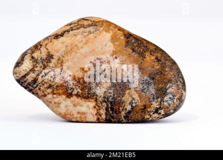 Macro foto a colori di una lucida ' Picture Stone Jasper ' una gemma di cristallo semi-preziosa utilizzata nella terapia di guarigione dei cristalli Foto Stock