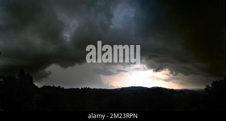 Dramatic sky, cyclone.Gray storm clouds filled with rain. Stock Photo