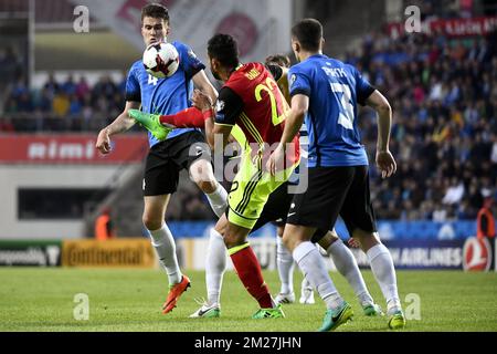 Estonia's Mattias Pikk, Belgium's Nacer Chadli and Estonia's Artur Pikk pictured in action during a World Cup 2018 qualifying game between Estonia and Belgian national soccer team Red Devils, Friday 09 June 2017, in Tallinn, Estonia. BELGA PHOTO DIRK WAEM Stock Photo