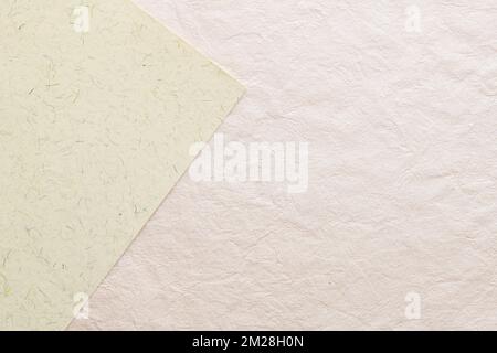 Primo piano della sovrapposizione della superficie del modello di carta fatto a mano. Spazio di copia per l'immissione di testo. Foto Stock