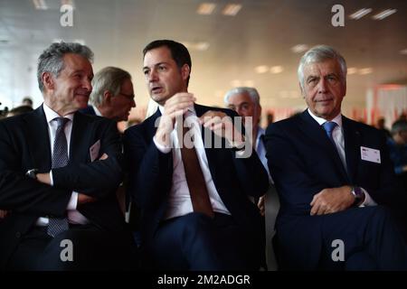 B-Post CEO Koen Van Gerven, Vice-Prime Minister and Minister of Cooperation Development, Digital Agenda, Telecom and Postal services Alexander De Croo and B-Post Francois Cornelis pictured during the official opening of the brand new sorting office of Brussels Xof B-Post, Friday 20 October 2017. With 80.000 meters square, the new Brussels X is the biggest infrastructure project ever done by B-Post. BELGA PHOTO Stock Photo