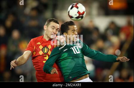 Belgium's Thomas Vermaelen and Mexico's Giovani dos Santos fight for the ball during a friendly soccer game between Belgian national team Red Devils and Mexico, Friday 10 November 2017, in Brugge. BELGA PHOTO VIRGINIE LEFOUR Stock Photo