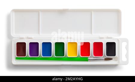 Watercolor Paint Set Palette with Brush Cut Out on White. Foto Stock
