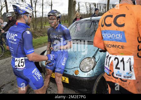 American Eric Marcotte of UnitedHealthcare, American Travis McCabe of UnitedHealthcare and Slovenian Marko Kump of CCC Sprandi Polkowice pictured after a crash during the 106th edition of the 'Scheldeprijs' one day cycling race, 200,4 km from Borsele to Schoten, Wednesday 04 April 2018. BELGA PHOTO YORICK JANSENS Stock Photo