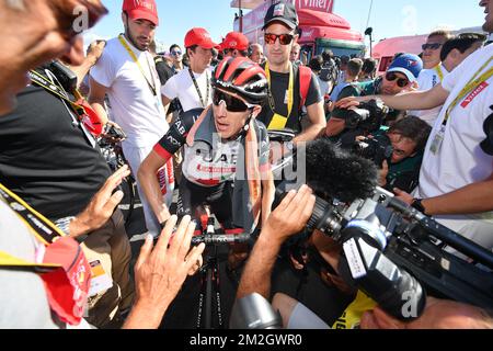 Irish Dan Martin del Team Emirates celebra dopo aver vinto la sesta tappa della 105th° edizione della gara ciclistica Tour de France, da Brest a Mur de Bretagne Guerledan (181 km), in Francia, giovedì 12 luglio 2018. Il Tour de France di quest'anno si svolge dal 7th al 29th luglio. FOTO DI BELGA DAVID STOCKMAN Foto Stock