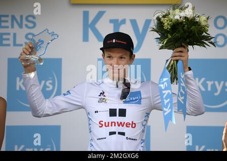 Danish Soren Kragh Andersen of Team Sunweb celebrates on the podium in the white jersey for best young rider after the seventh stage of the 105th edition of the Tour de France cycling race, from Fougeres to Chartres (231 km), in France, Friday 13 July 2018. This year's Tour de France takes place from July 7th to July 29th. BELGA PHOTO YORICK JANSENS Stock Photo