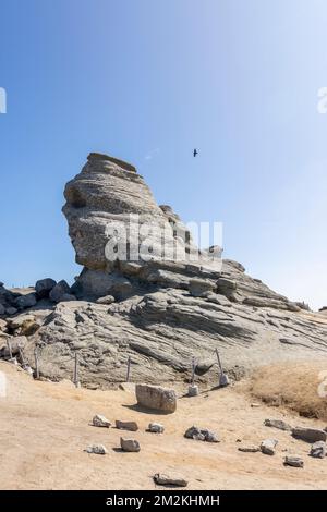 A vertical closeup view of the famous Sphinx from the Bucegi Mountains in Romania Stock Photo