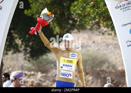 Il belga Preben Van Hecke dello Sport Vlaanderen-Baloise festeggia sul podio come leader della più aggressiva classificazione Rider dopo la terza tappa dell'Oman ciclismo Tour 2019, 192,5km da Shati al Qurum a Qurayyat, lunedì 18 febbraio 2019. Quest'anno il Tour dell'Oman si svolge dal 16 al 21 febbraio. FOTO DI BELGA YUZURU SUNADA FRANCE OUT Foto Stock