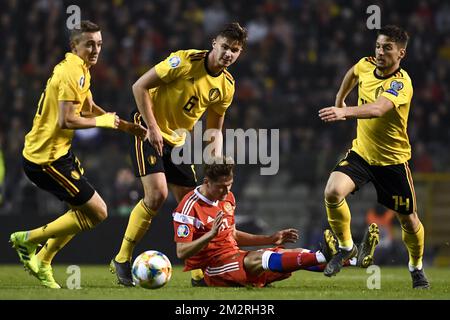 Il belga Timothy Castagne, il belga Leander Dendoncker, il russo Aleksandr Golovin e il belga Dries Mertens hanno mostrato in azione durante una partita tra la nazionale belga di calcio Red Devils e la Russia, a Bruxelles, giovedì 21 marzo 2019, la prima di una serie di 10 partite di qualificazione della Coppa europea 2020. FOTO DI BELGA DIRK WAEM Foto Stock