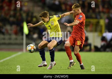 James Forrest scozzese e Thorgan Hazard in Belgio combattono per la palla durante una partita di calcio tra la nazionale belga Red Devils e la Scozia, martedì 11 giugno 2019 a Bruxelles, una partita di qualificazione UEFA euro 2020. FOTO DI BELGA YORICK JANSENS Foto Stock