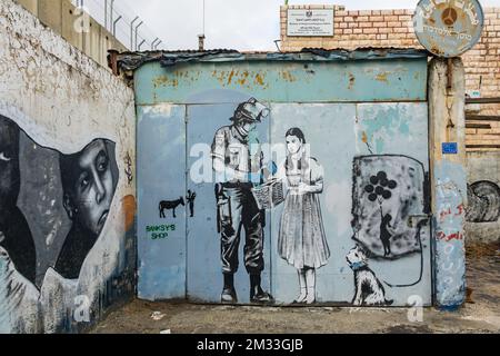 Graffiti al muro di separazione a Betlemme, in Cisgiordania, Palestina. Foto Stock