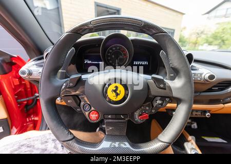Slovenia, Lubiana - 2 giugno 2022: Red Ferrari F8 Tributo Italian Luxury sports car interior Foto Stock