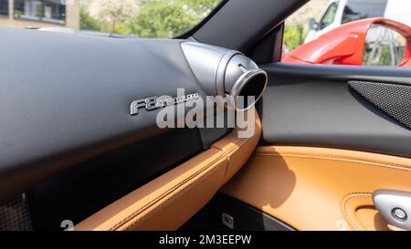 Slovenia, Lubiana - 2 giugno 2022: Red Ferrari F8 Tributo Italian Luxury sports car interior Foto Stock
