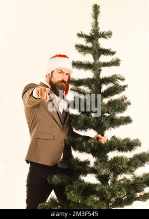 Il regista con barba si prepara per Natale. Foto Stock