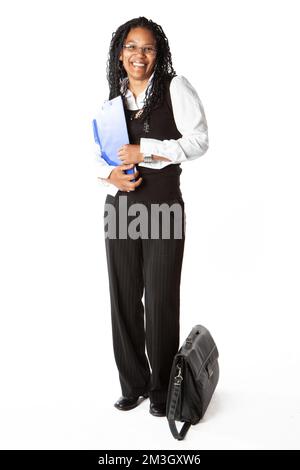 Studenti adolescenti: Insegnante di classe. Un grande sorriso e contatto visivo da un tutor amichevole college pronto a prendere la sua classe. Verticale a lunghezza intera. Foto Stock