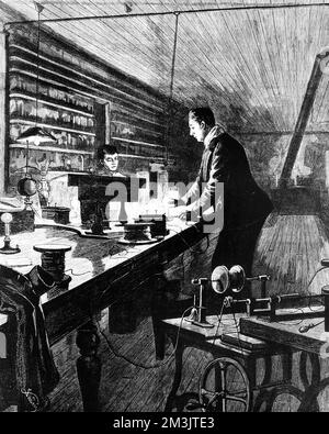 La luce elettrica - il signor Edison nel suo laboratorio. Foto Stock