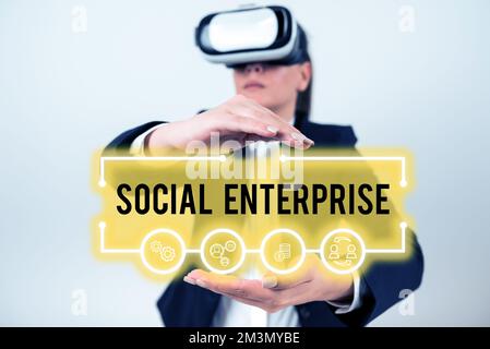 Visualizzazione concettuale Social Enterprise. Parola per il commercio che fa i soldi in un senso socialmente responsabile Foto Stock